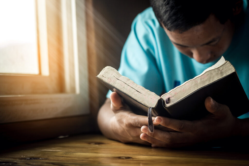 Man studying Bible